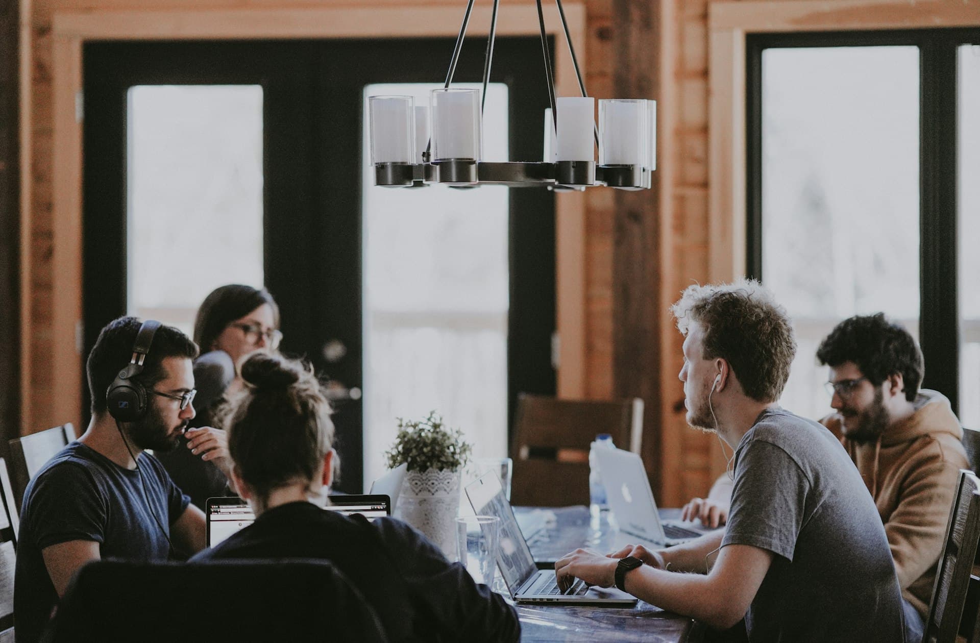 Team handling customer calls in a modern office